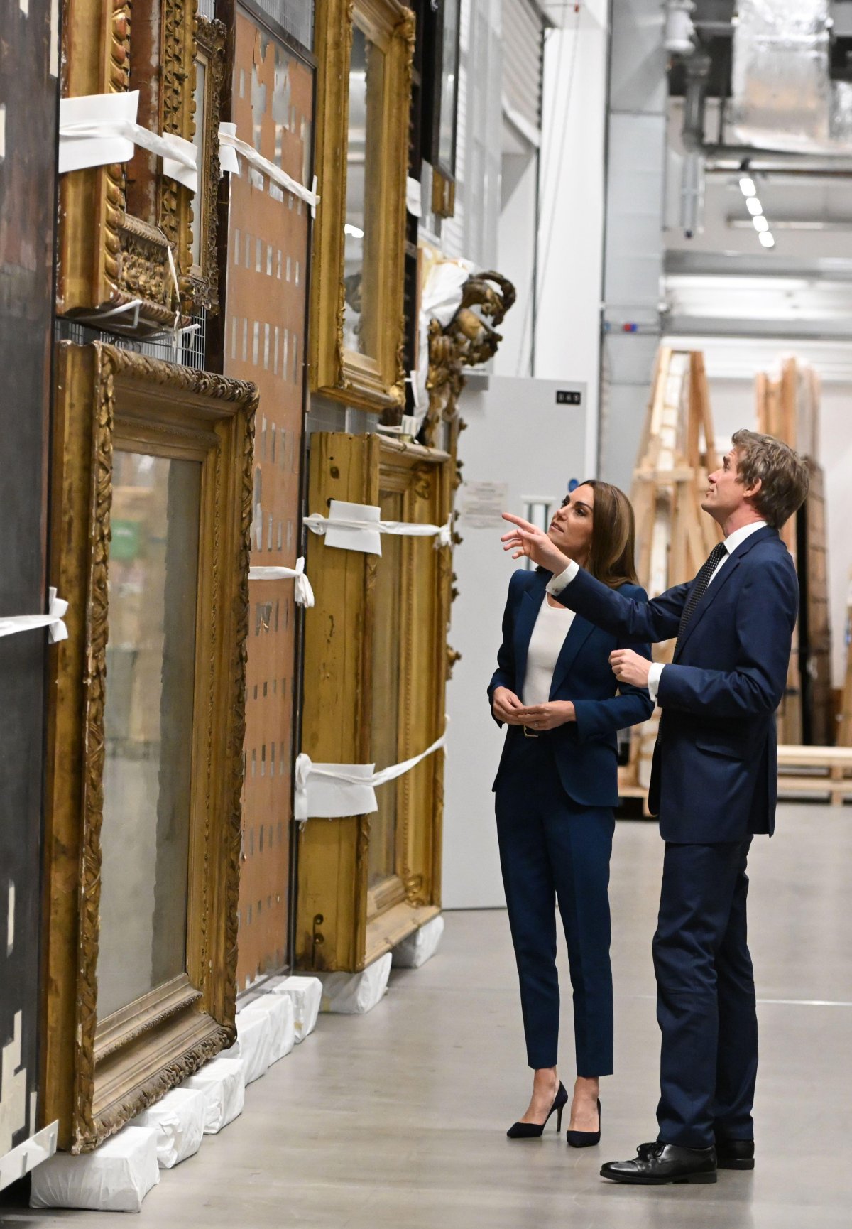The Princess of Wales, with V&A director Tristram Hunt, visits the V&A East Storehouse in east London on June 10, 2025 (Eddie Mulholland/PA Images/Alamy)