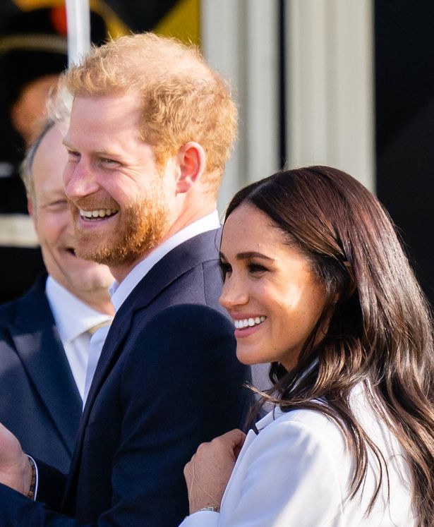 Prince Harry, Duke of Sussex and Meghan, Duchess of Sussex smiling 