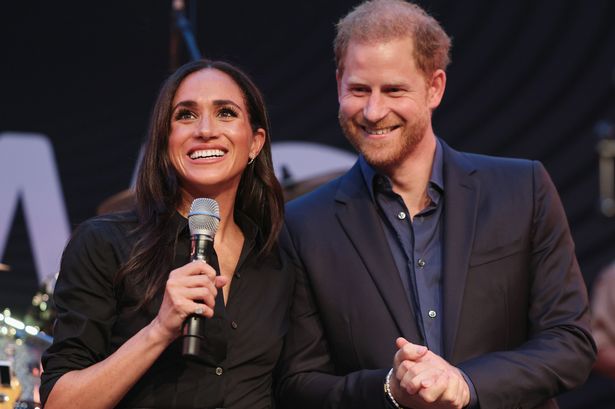 Prince Harry, Duke of Sussex and Meghan, Duchess of Sussex speak on stage at the "Friends @ Home Event" at the Station Airport during day three of the Invictus Games Düsseldorf 2023 on September 12, 2023 in Duesseldorf, Germany. (Photo by Chris Jackson/Getty Images for the Invictus Games Foundation)