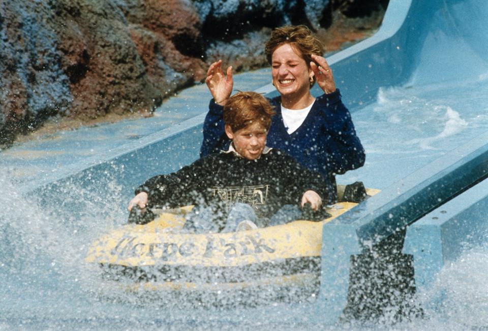 Princess Diana and Prince Harry ride a log flume on April 18, 1992 at Thorpe Park in the UK