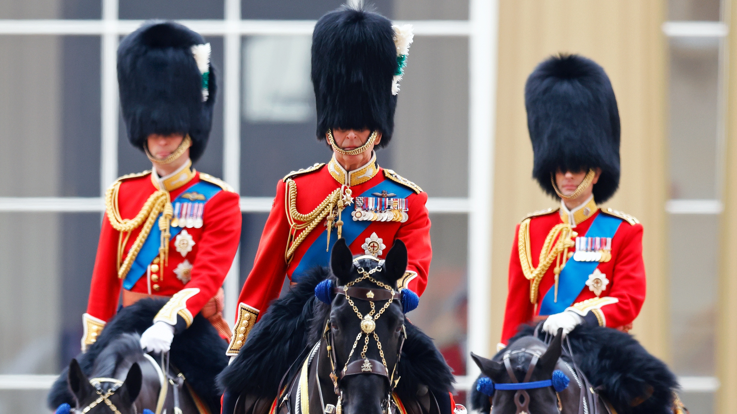 King Charles III (C), Prince William (L) and Prince Edward (R) depart Buckingham Palace on horseback to attend Trooping the Colour on June 17, 2023
