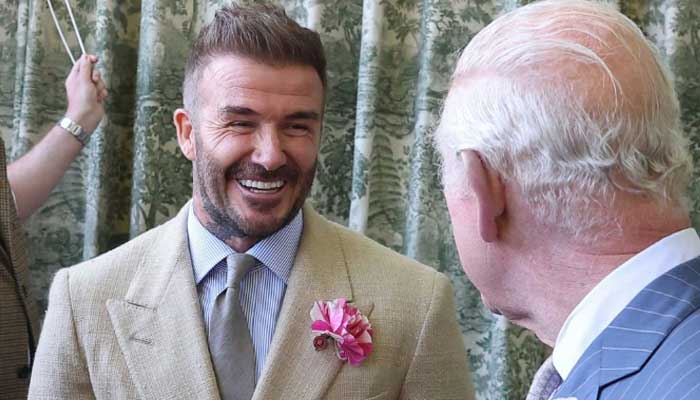 David Beckham all smiles as he joins fiancée of Prince Williams friend at Wimbledon