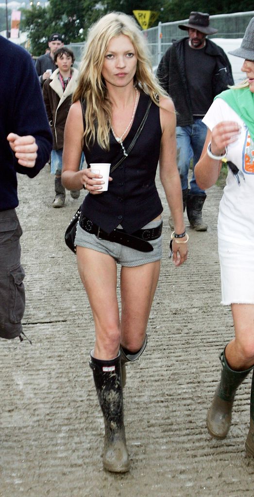 Supermodel Kate Moss seen at the first day of the Glastonbury Music Festival 2005 at Worthy Farm, Pilton on June 24, 2005 in Somerset, England. The festival runs until June 26.  (Photo by MJ Kim/Getty Images)