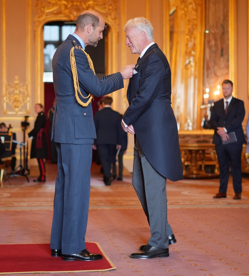David Moyes receiving an OBE from the Prince of Wales at Windsor Castle.