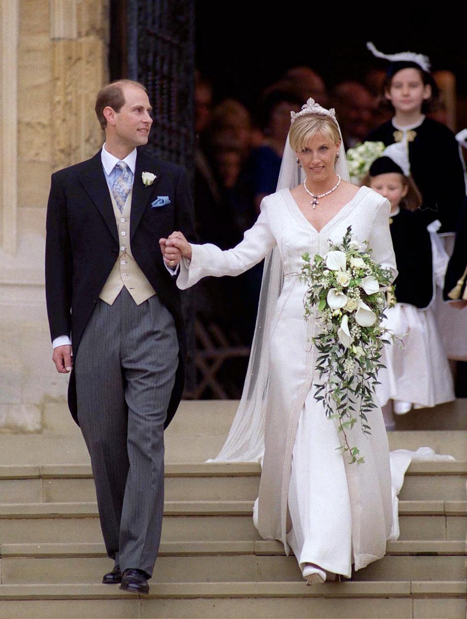 Prince Edward and Duchess Sophie on their wedding day walking out of church