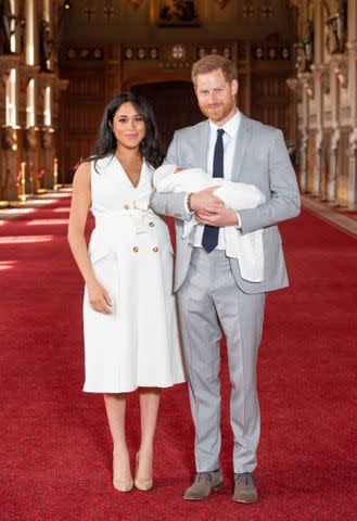 Dominic Lipinski - WPA Pool/Getty Images Meghan Markle, Prince Archie and Prince Harry during a photo call at St. George's Hall at Windsor Castle on May 8, 2019.