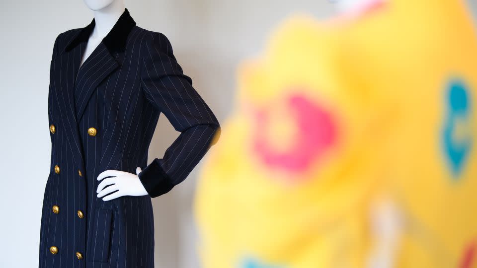 A navy wool pinstripe double-breasted coatdress, designed by Catherine Walker, that Princess Diana was pictured wearing while leaving the Carlyle Hotel in New York in January 1995. It is expected to fetch between $30,000 and $50,000 at auction later this month. - Joe Maher/Getty Images