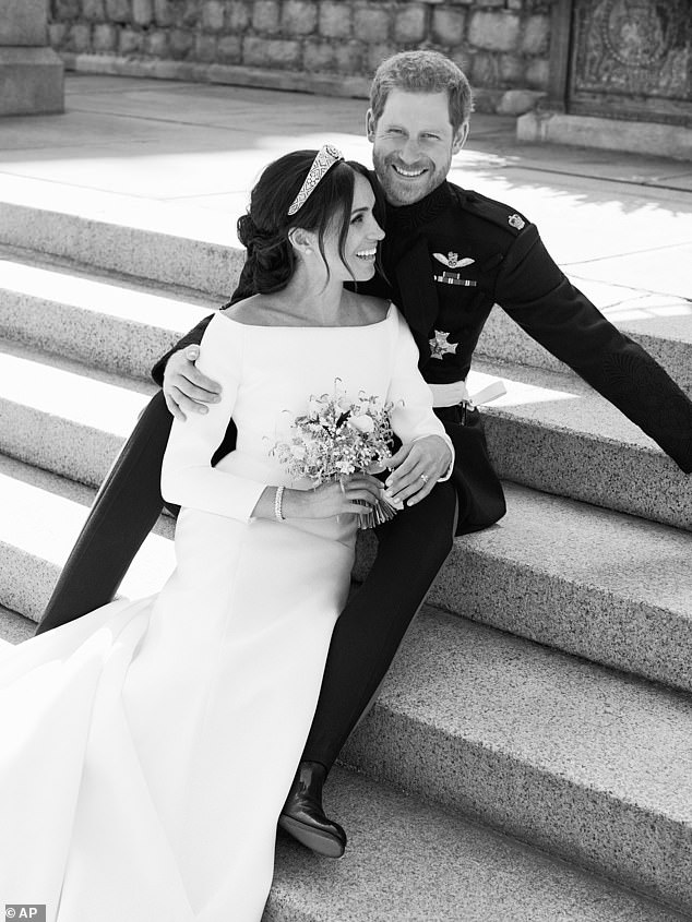 Later, he took photos of Harry and Meghan alone in the rose garden on the east terrace of Windsor Castle
