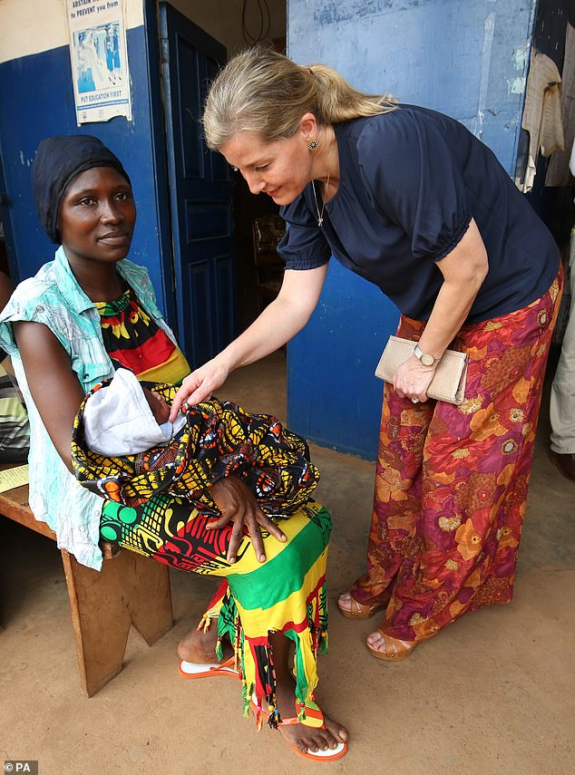 The Countess of Wessex meets mothers and their newborns at Tombo Health Clinic which offers family planning and maternal care services to women in Sierra Leone