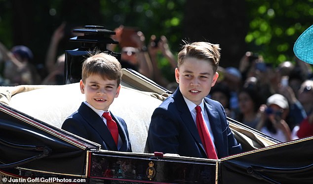 Princes Louis and George wore matching suits and ties as they sat in an open-top carriage with their mother, the Princess of Wales
