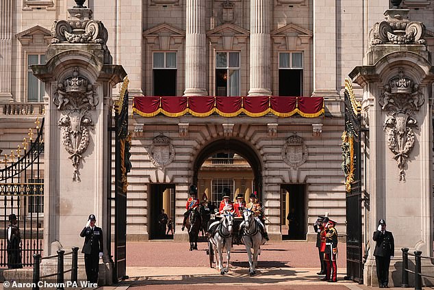 Carriages leave Buckingham Palace during the Trooping of the Colour parade