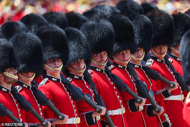 Members of the King's guards stand to attention during the Trooping the Colour