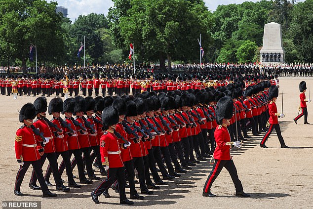 Members of the King's Guard take part in the Trooping the Colour parade which honours Britain's King Charles on his official birthday