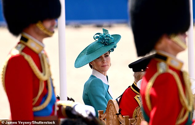 Once at the parade ground, the Princess of Wales watched on alongside the King and Queen