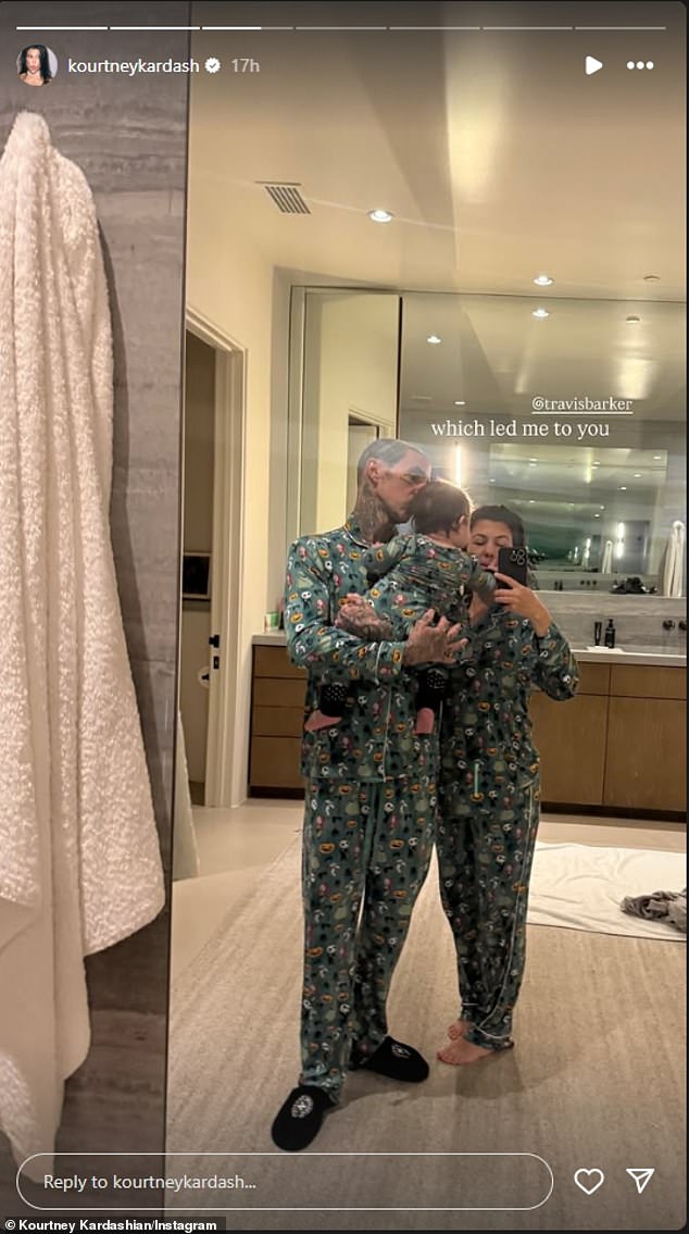 Kardashian then posted a PJ-clad snap of herself with husband Travis Barker and their 19-month-old son Rocky Thirteen that she captioned: 'Which led me to you @travisbarker'