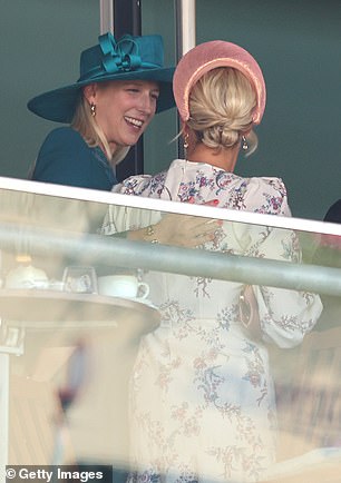 Lady Gabriella Windsor and Zara Tindall hug as they attend day two of Royal Ascot
