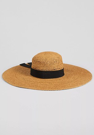 Simple, structured and effortlessly sophisticated, the Saffron Straw Floppy Sun Hat elevates any outfit without stealing the spotlight