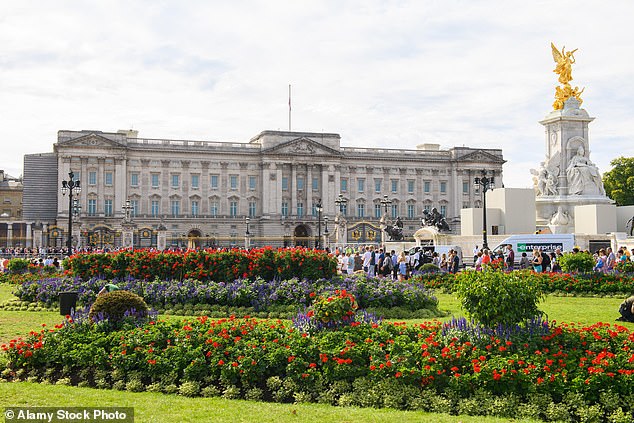 Meghan was even seen posing outside Buckingham Palace as a child (stock image)
