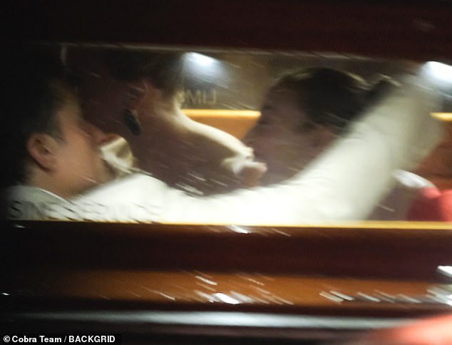 Bloom was caught wrapping his arm around a mystery brunette in a water taxi last night