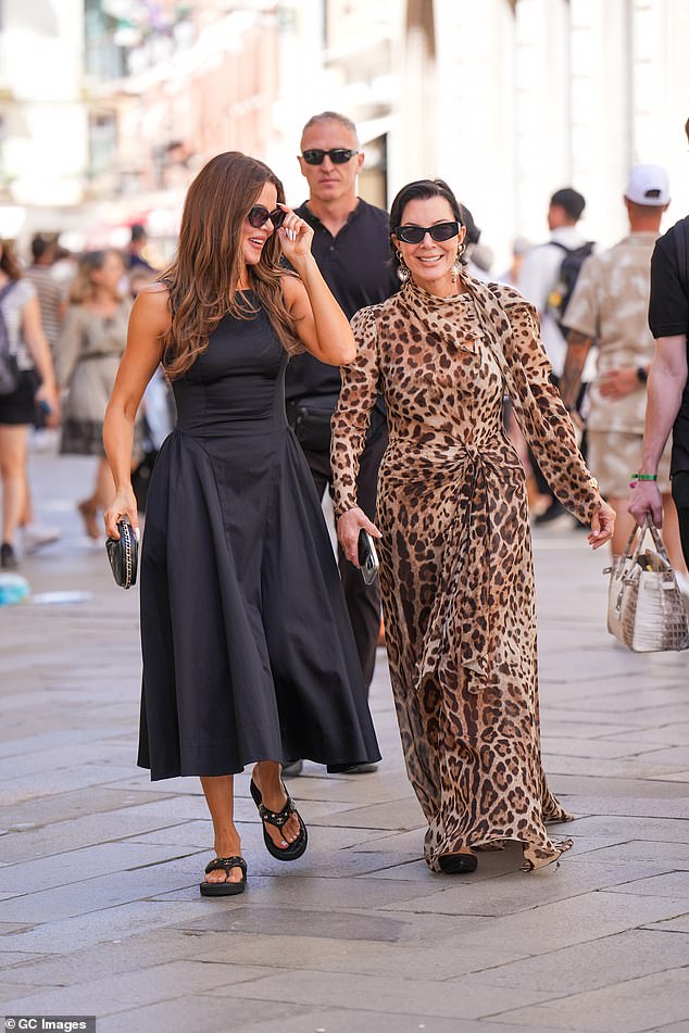 The birthday girl slipped her gym-honed figure into a simple black summer dress for the outing, which she teamed with oversized dark shades and chic Chanel flip-flops
