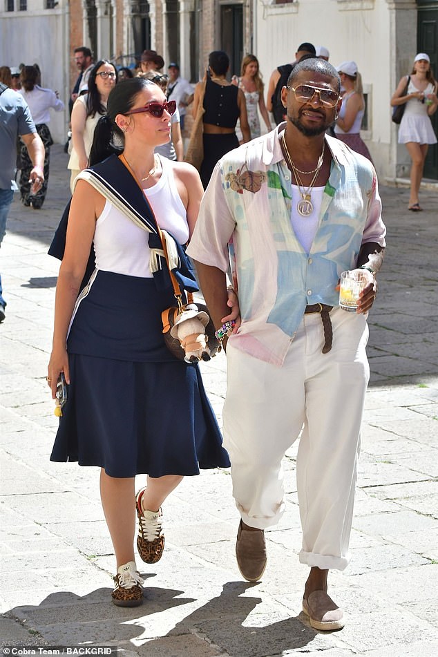 Both dressed in effortless, European summer looks, the couple took in the sights of the iconic city while keeping things casual