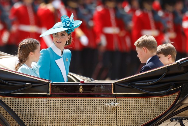 LONDON, ENGLAND - JUNE 14: Princess Charlotte of Wales, Catherine, Princess of Wales, Prince George of Wales and Prince Louis of Wales at Horse Guards Parade during Trooping The Colour 2025 on June 14, 2025 in London, England. Trooping The Colour is a ceremonial parade celebrating the official birthday of the British Monarch. The event features over 1,400 soldiers and officers, accompanied by 200 horses. More than 400 musicians from ten different bands and Corps of Drums march and while performing. (Photo by John Phillips/Getty Images)