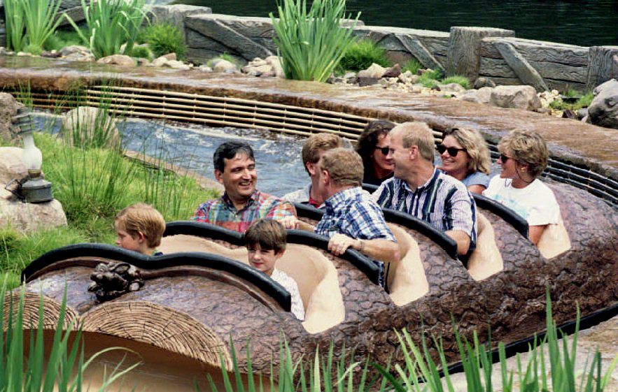 Princess Diana (back row, R), along with her friends Kate Menzies (back row C) and Catherine Soames (back row, L), rides 26 August 1993 the Splash Mountain ride at Disney World's Magic Kingdom during the third day of their vacation. Front row left is Prince Harry, son of Princess Diana. Other passengers are unidentified