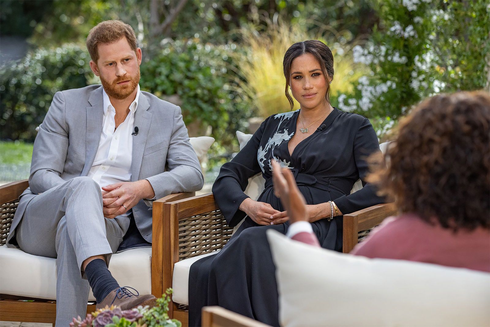 Image may contain Sitting Human Person Prince Harry Duke of Sussex Plant Meghan Duchess of Sussex and Clothing