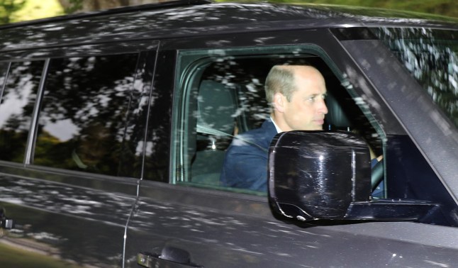 Prince William at Crathie Church this morning(Prince George is just visible in the back seat....pic Peter Jolly
