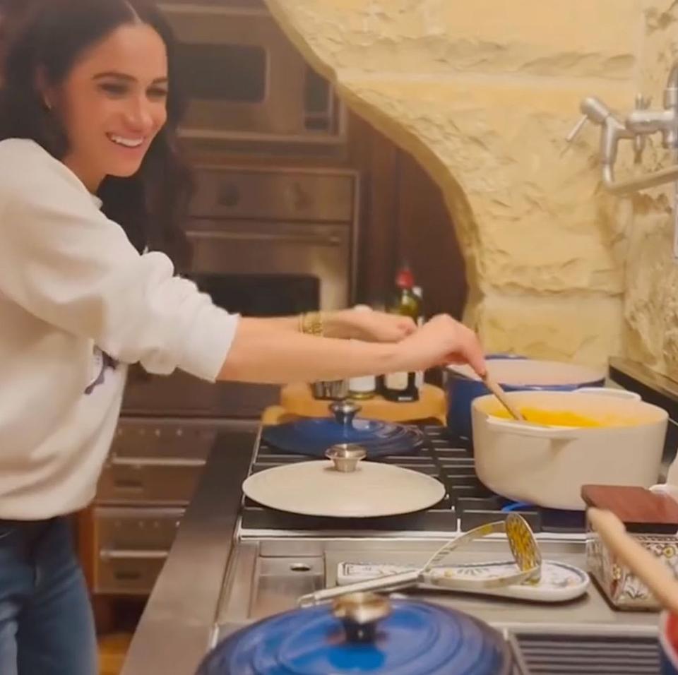 Meghan Markle cooking in her kitchen. meghan/Instagram