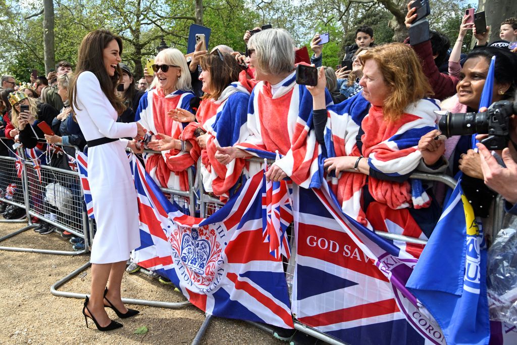 Kate Middleton meets well-wishers during a walkabout on the Mall outside Buckingham Palace ahead of the coronation of Britain's King Charles and Camilla, Queen Consorton May 5, 2023 in London, England. 