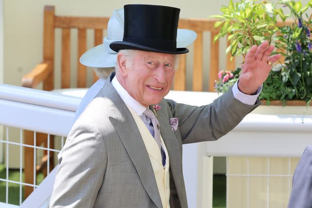 Chris Jackson/Getty King Charles waves as he arrives at day three of Royal Ascot, in Berkshire, England, on June 19, 2025
