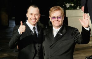 WINDSOR, UNITED KINGDOM - DECEMBER 21: Celebrity couple Sir Elton John and David Furnish leave as a married couple following their civil partnership ceremony at the Guildhall, Windsor on December 21, 2005 in Windsor, Berkshire. Today is the first day that gay couples can legally marry in England following The Civil Partnership Act being brought into force. (Photo by Daniel Berehulak/Getty Images) *** Local Caption *** Elton John;David Furnish
