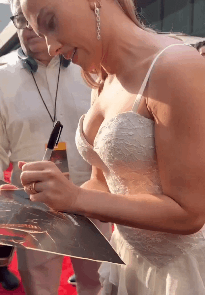 Scarlett Johansson signing autographs at the "Jurassic World Rebirth" New York Premiere at Lincoln Center in New York City - June 2025