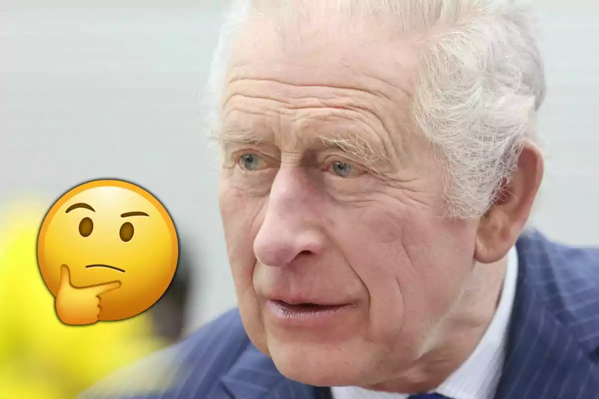 Older man with gray hair and a serious expression, with a thinking face emoji next to him
