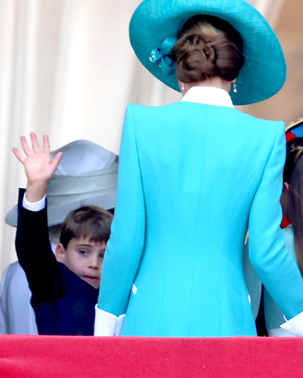 london, england june 14: prince louis of wales waves from the balcony and he heads inside with catherine, princess of wales, princess charlotte of wales and prince william, prince of wales during trooping the colour 2025 on june 14, 2025 in london, england. trooping the colour is a ceremonial parade celebrating the official birthday of the british monarch. the event features over 1,400 soldiers and officers, accompanied by 200 horses. more than 400 musicians from ten different bands and corps of drums march and while performing. (photo by chris jackson/getty images)