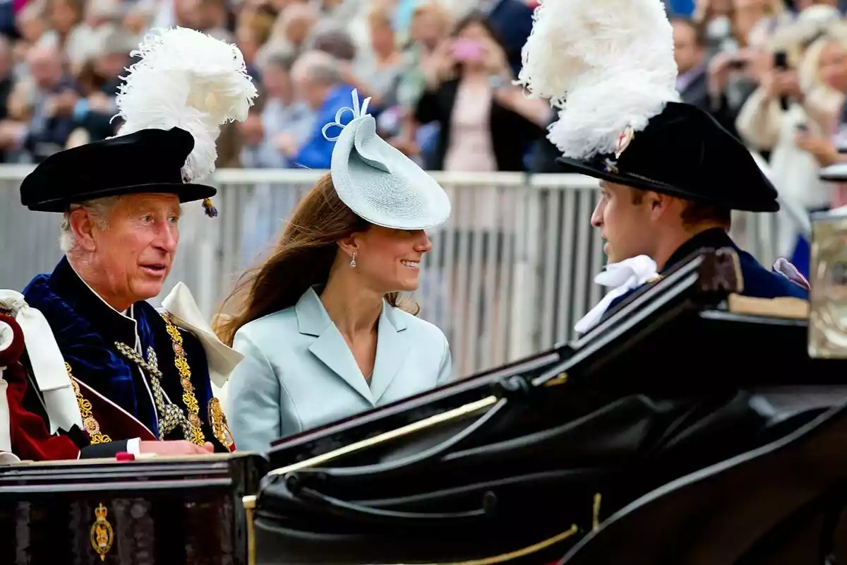 People dressed in formal suits and decorative hats travel in a carriage during an outdoor event. People dressed in formal suits and decorative hats travel in a carriage during an outdoor event.