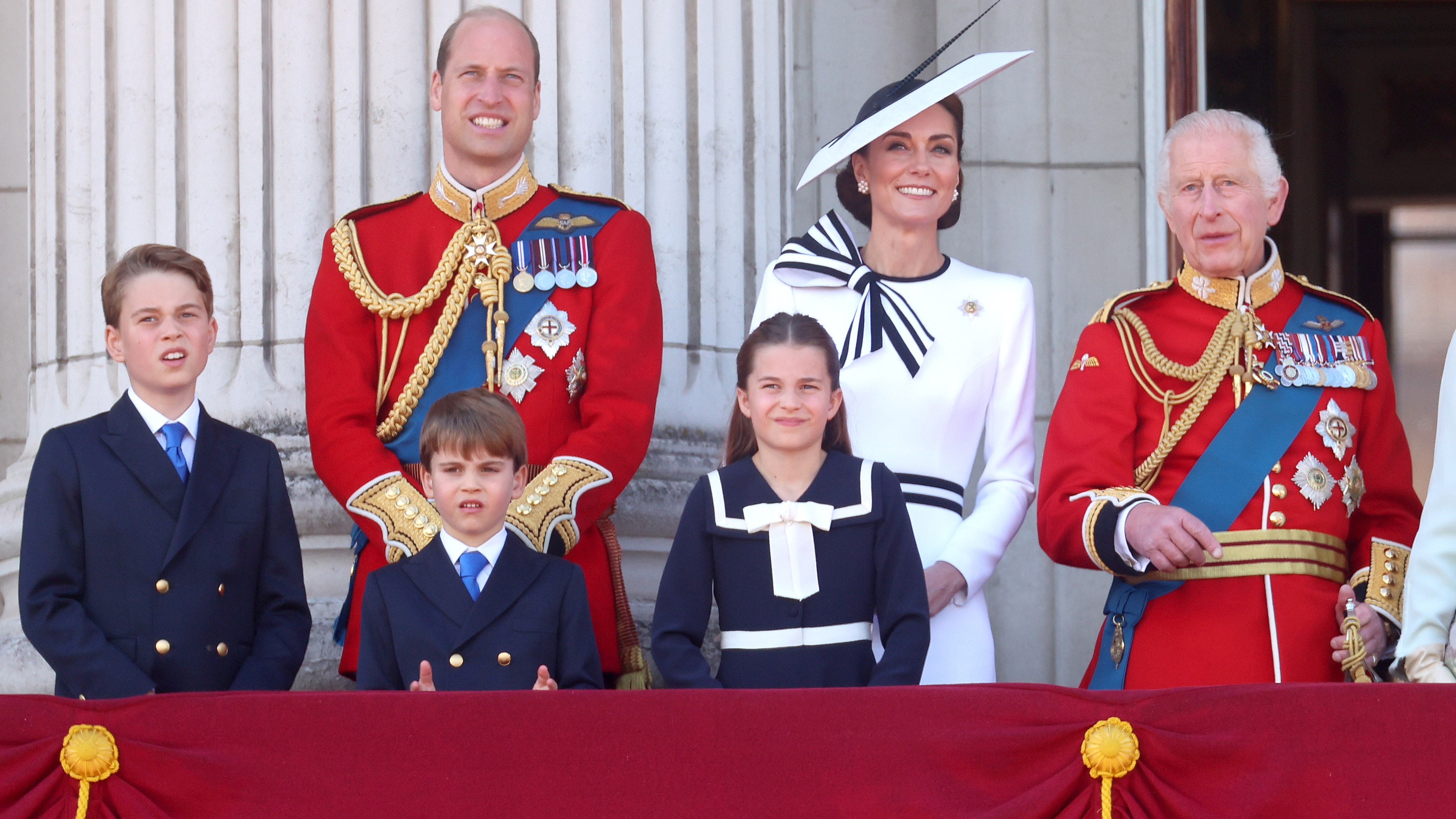 Prince George of Wales, Prince William, Prince of Wales, Prince Louis of Wales, Catherine, Princess of Wales, Princess Charlotte of Wales and King Charles III on the balcony during Trooping the Colour at Buckingham Palace on June 15, 2024