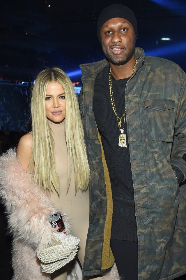 Khloe Kardashian and Lamar Odom at a fashion show.