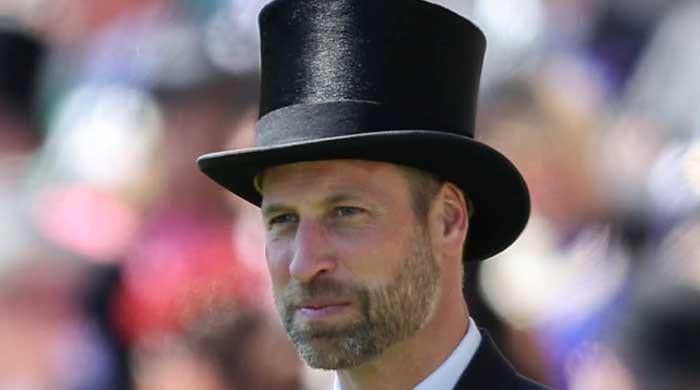 Prince William looks handsome as he rocks top hat
