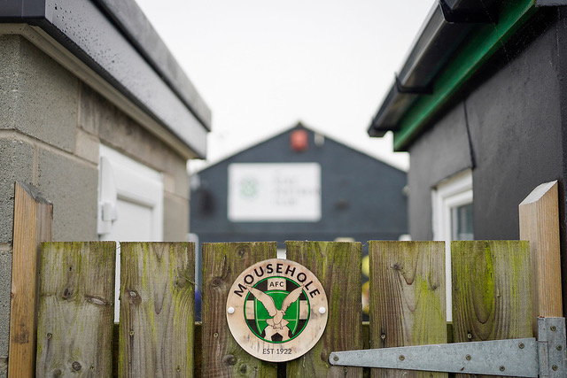 Mousehole AFC sign on a wooden gate.