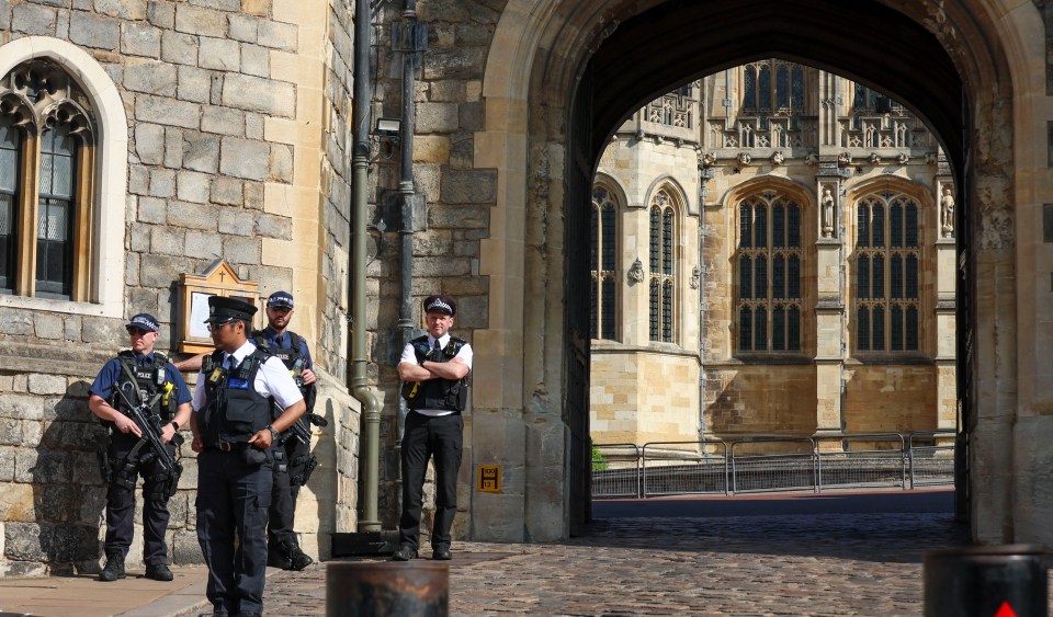 Police officers standing guard at Windsor Castle.