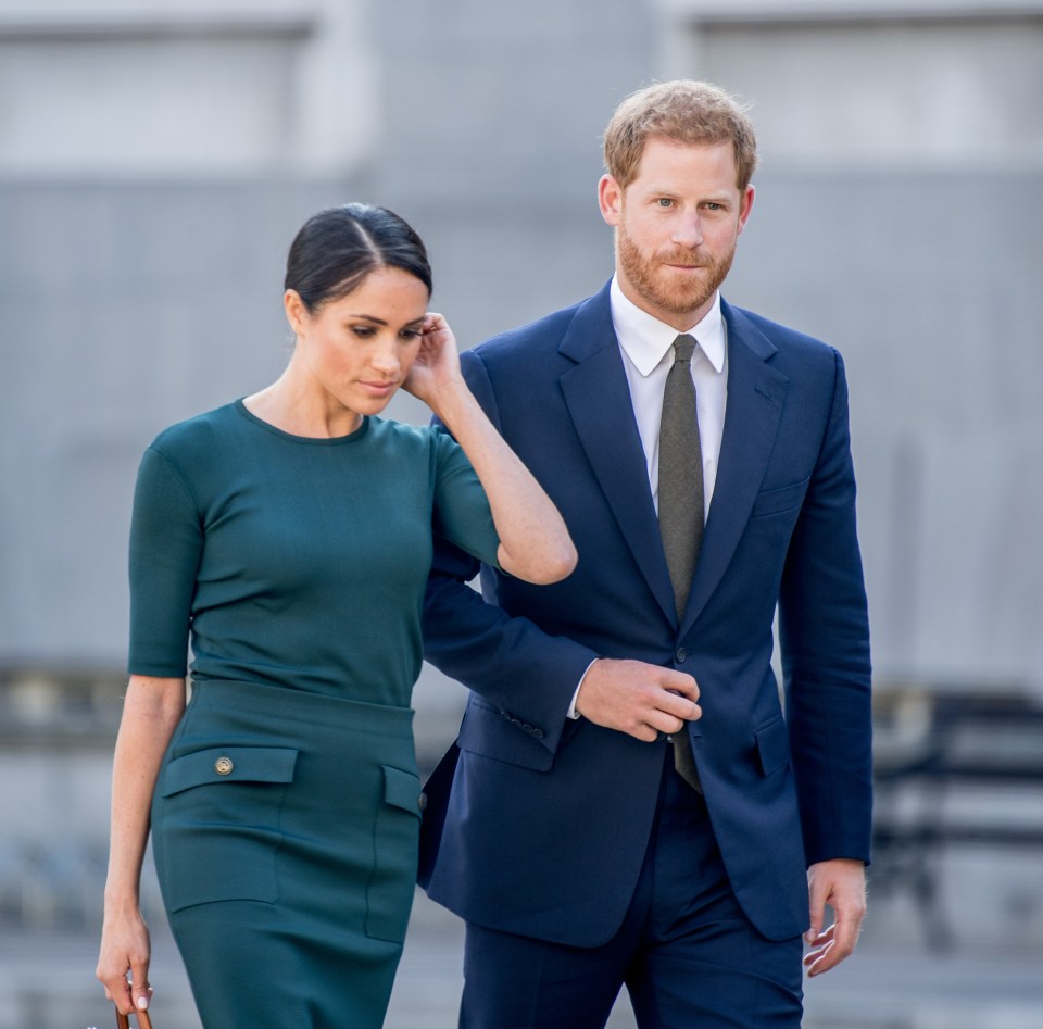 Prince Harry and Meghan Markle walking together.