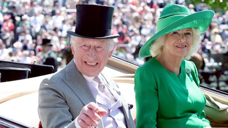 King Charles and Queen Camilla during the royal procession ahead of the day's races.
Pic Reuters