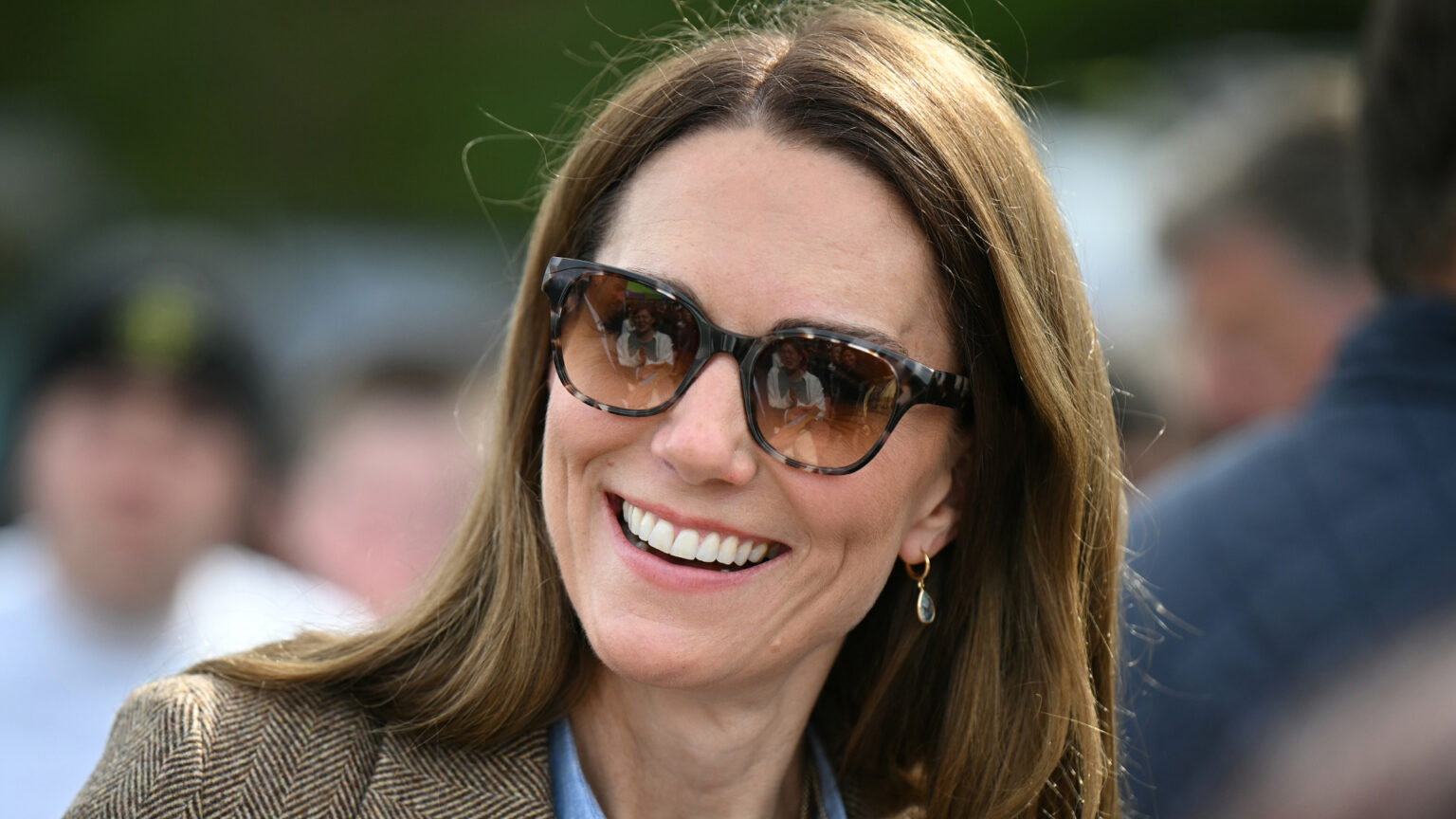Kate Middleton’s Bronde Hair Transformation Is Setting the Tone for Summer Kate Middleton wearing sunglasses and smiling
