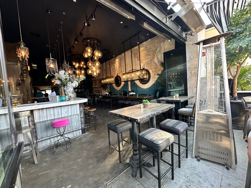 Interior and patio seating at TomTom bar.