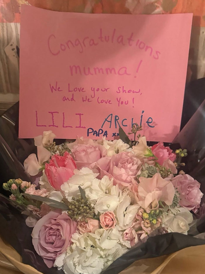 Bouquet of pink and white flowers with a handwritten congratulations card, related to Meghan Markle kitchen hack controversy. Bouquet of pink and white flowers with a handwritten congratulations card, related to Meghan Markle kitchen hack controversy.