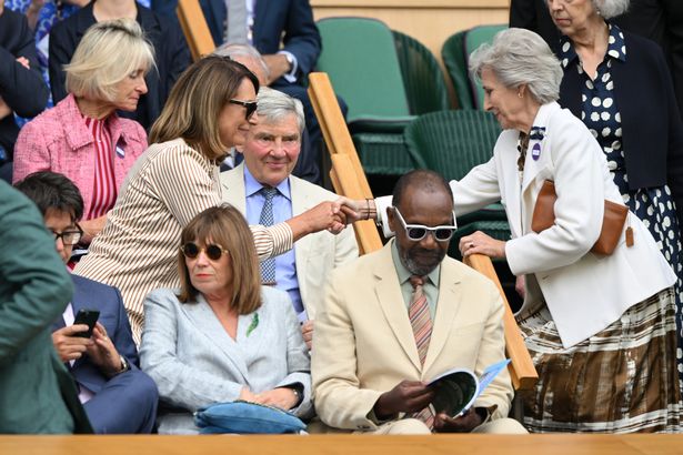 Carole and Michael greet the Duchess of Gloucester in the Royal Box at Wimbledon today
