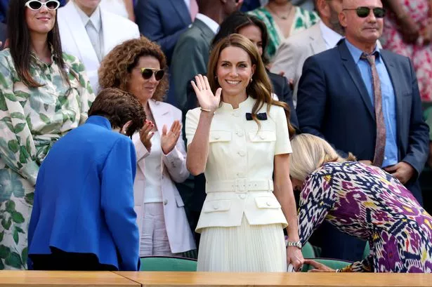 LONDON, ENGLAND - JULY 12: Catherine, Princess of Wales, Patron of The AELTC waves in the Royal Box prior to the the Ladies' Singles Final between Iga Swiatek of Poland and Amanda Anisimova of United States on day thirteen of The Championships Wimbledon 2025 at All England Lawn Tennis and Croquet Club on July 12, 2025 in London, England. (Photo by Clive Brunskill/Getty Images)