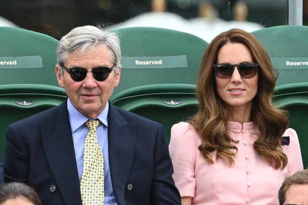 Michael Middleton and Catherine, Duchess of Cambridge attend day 13 of the Wimbledon Tennis Championships at All England Lawn Tennis and Croquet Club on July 11, 2021 in London, England.